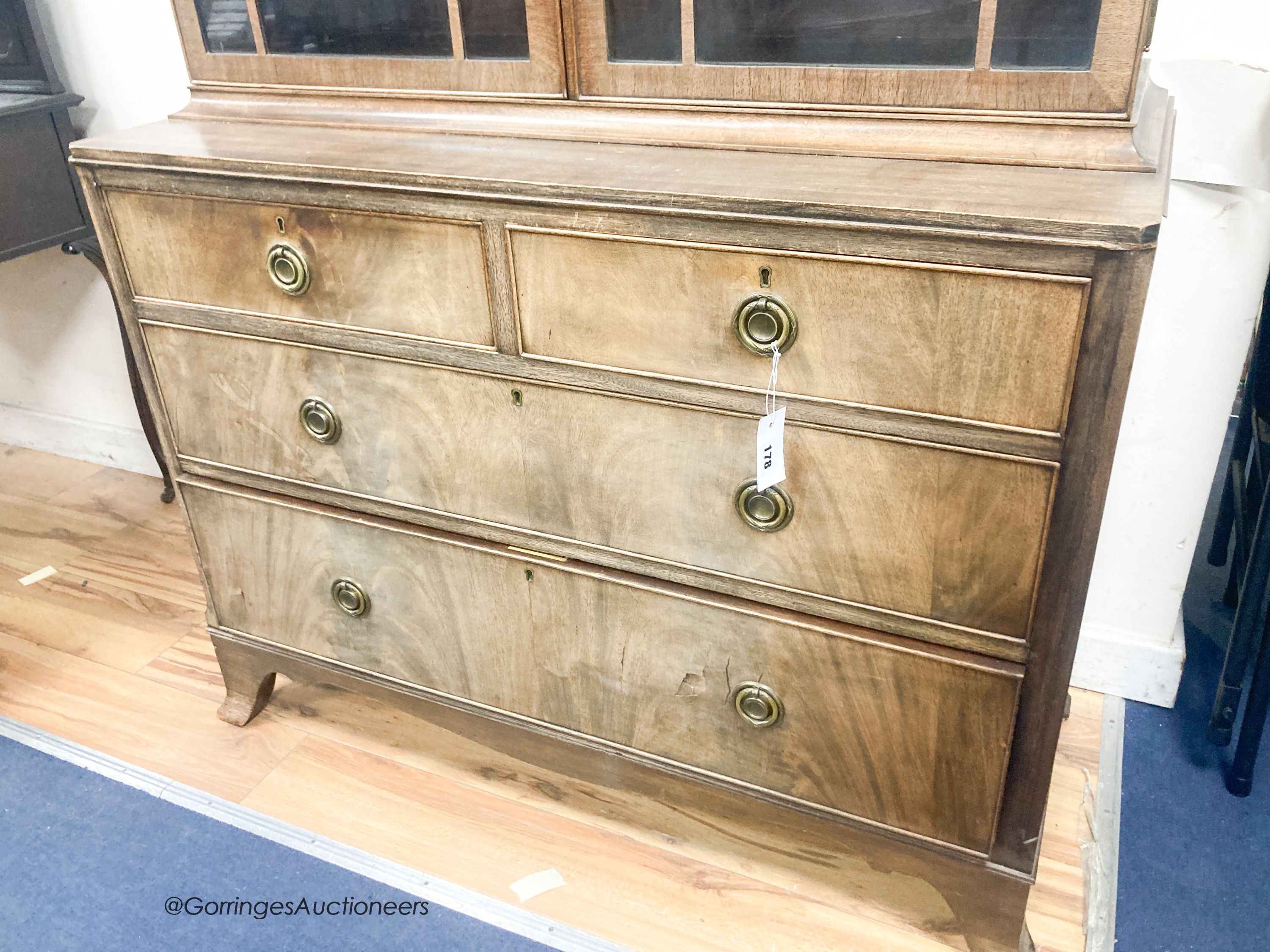 A George III style banded mahogany cabinet on chest, length 106cm, depth 48cm, height 191cm